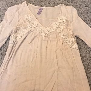 Off white mid length sleeve shirt